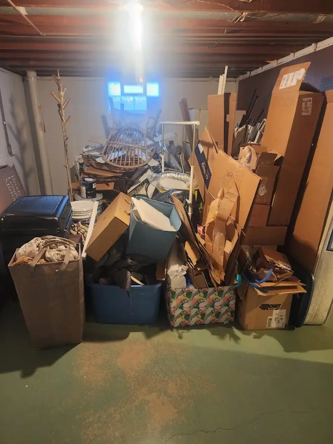 Roll-off dumpster container at job site for Concrete Dumpster Rental in Hartford